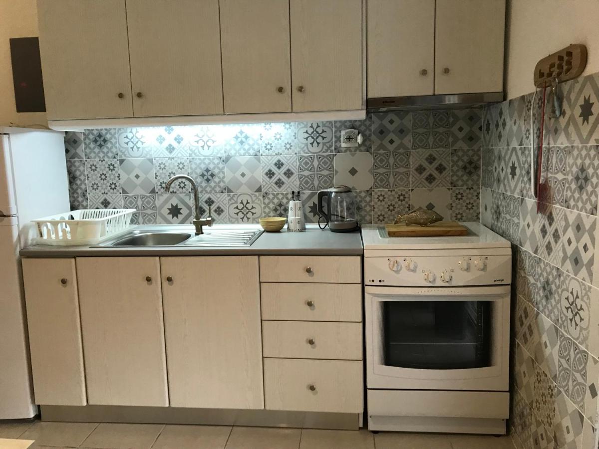 Grey Theros Apartments Paralia Dionysiou Exterior photo